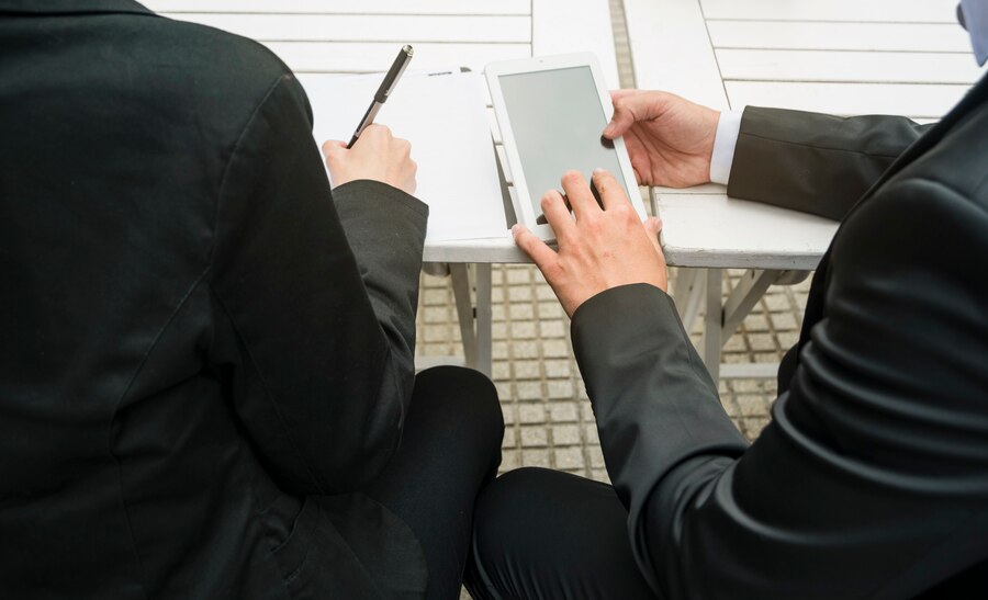 high-angle-man-signing-house-contract_23-2148346274